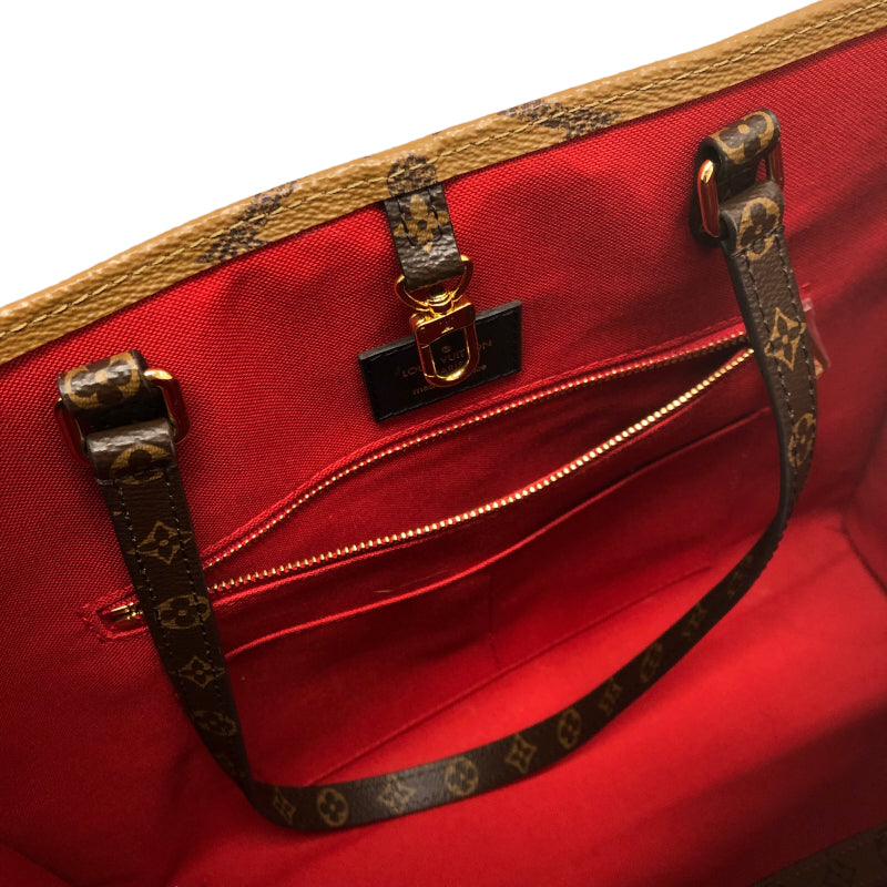 Louis Vuitton On The Go MM Monogram Giant Reverse Handbag