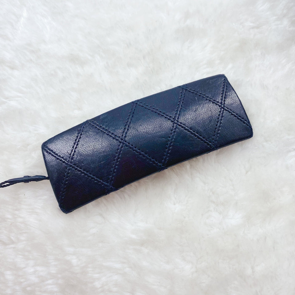 Chanel quilted black hair Barrett