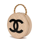 Chanel Vintage Round Vanity Bag Beige and Black Patent Leather Antique Gold Hardware