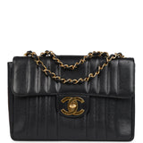 Chanel Vintage Jumbo Mademoiselle Vertical Flap Black Caviar Gold Hardware