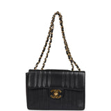 Chanel Vintage Jumbo Mademoiselle Vertical Flap Black Caviar Gold Hardware