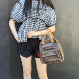 Louis Vuitton excentri cite handbag
