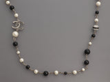 Chanel Long Black Beads, Pearls, and Crystal Logos Necklace