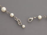 Chanel Long Pearl and Crystal Logo Necklace