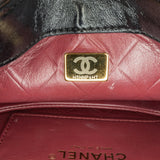 Chanel CC Quilted Calfskin Round Moon Messenger Flap