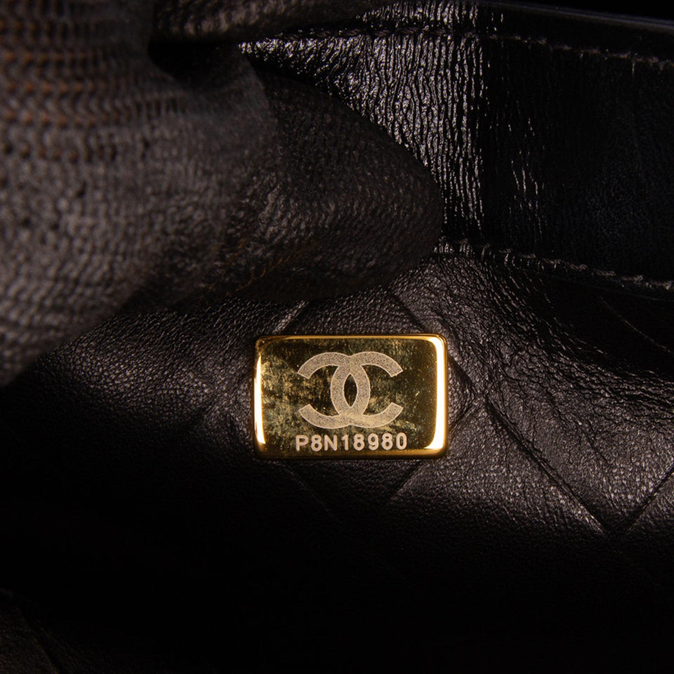 Chanel CC Quilted Calfskin Round Moon Messenger Flap