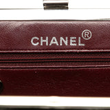 Chanel CC Quilted Lambskin Kiss Lock Frame Top Handle Bag