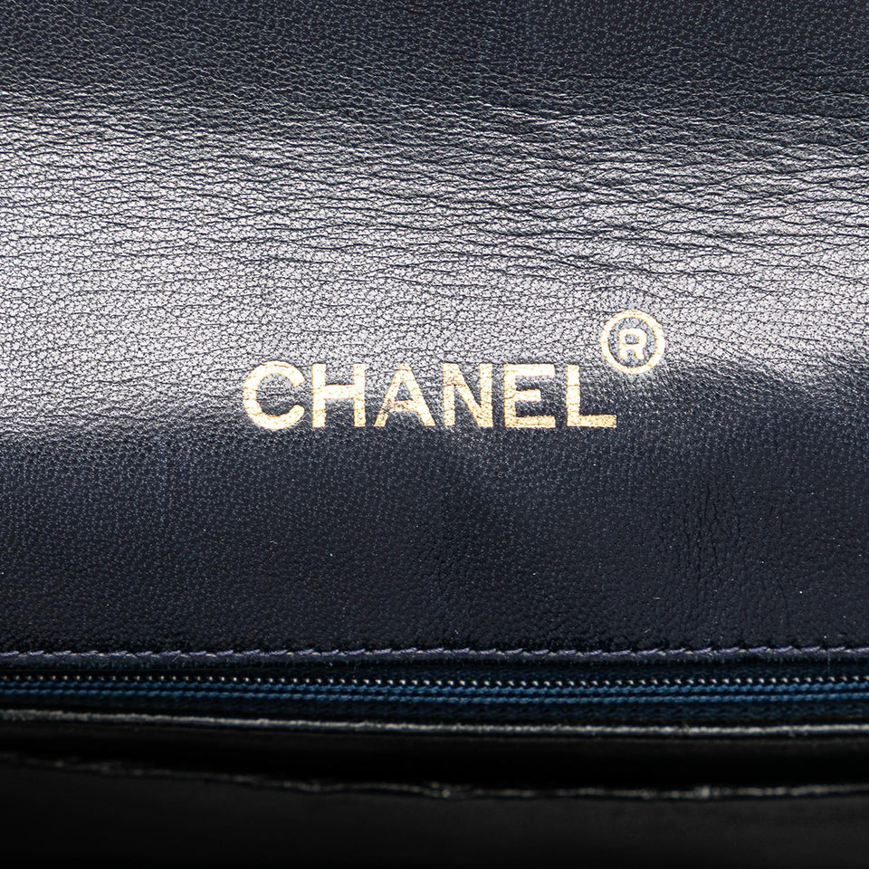 Chanel CC Quilted Lambskin Round Flap