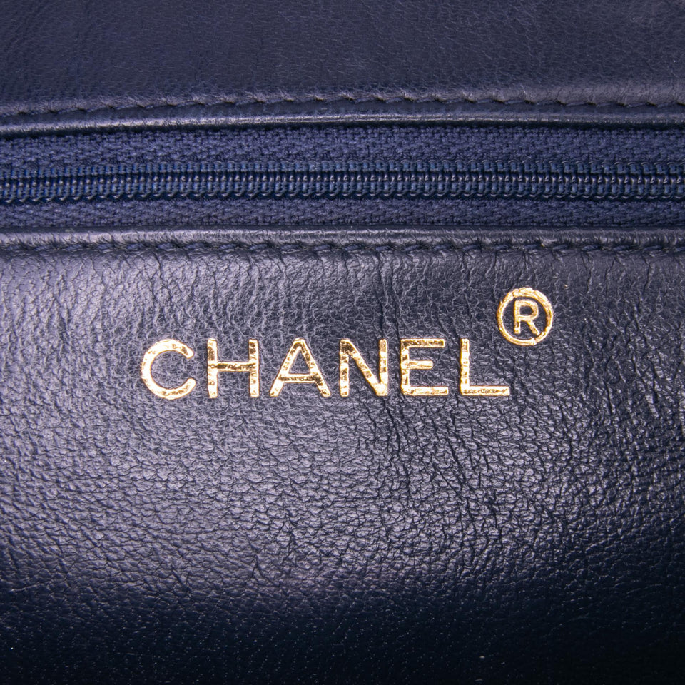 Chanel CC Quilted Lambskin Tassel Flap