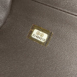 Chanel CC Quilted Metallic Caviar Clutch