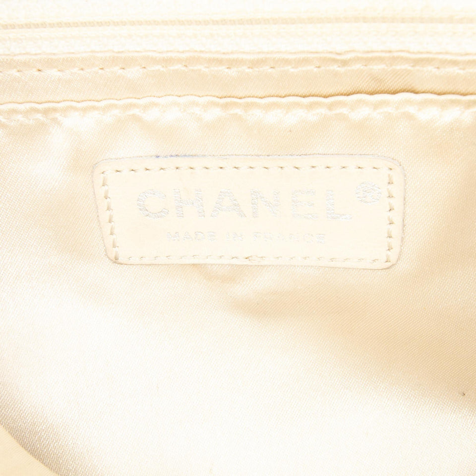 Chanel CC Quilted Perforated Aged Calfskin Flap