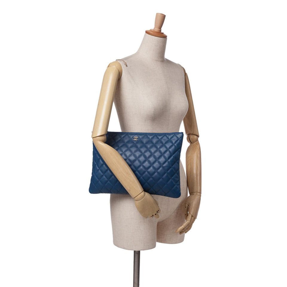 Chanel Large Quilted Lambskin O Case Clutch