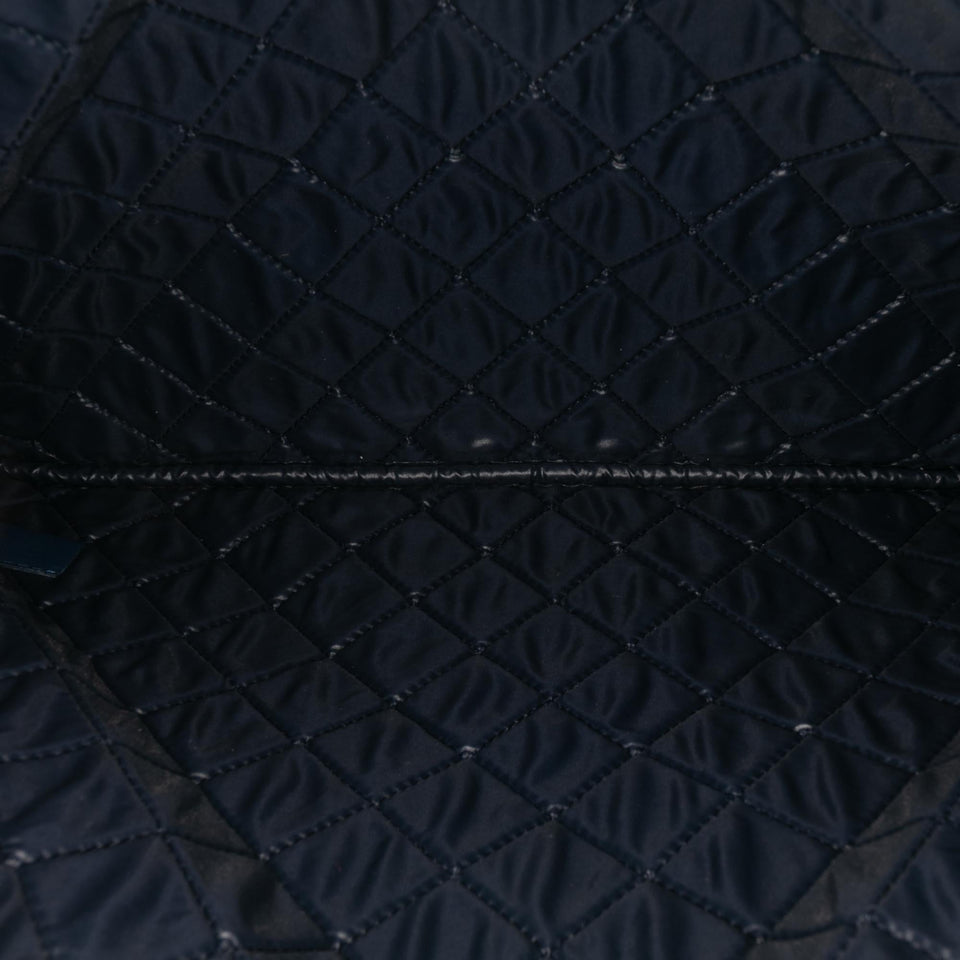 Chanel Large Quilted Lambskin O Case Clutch