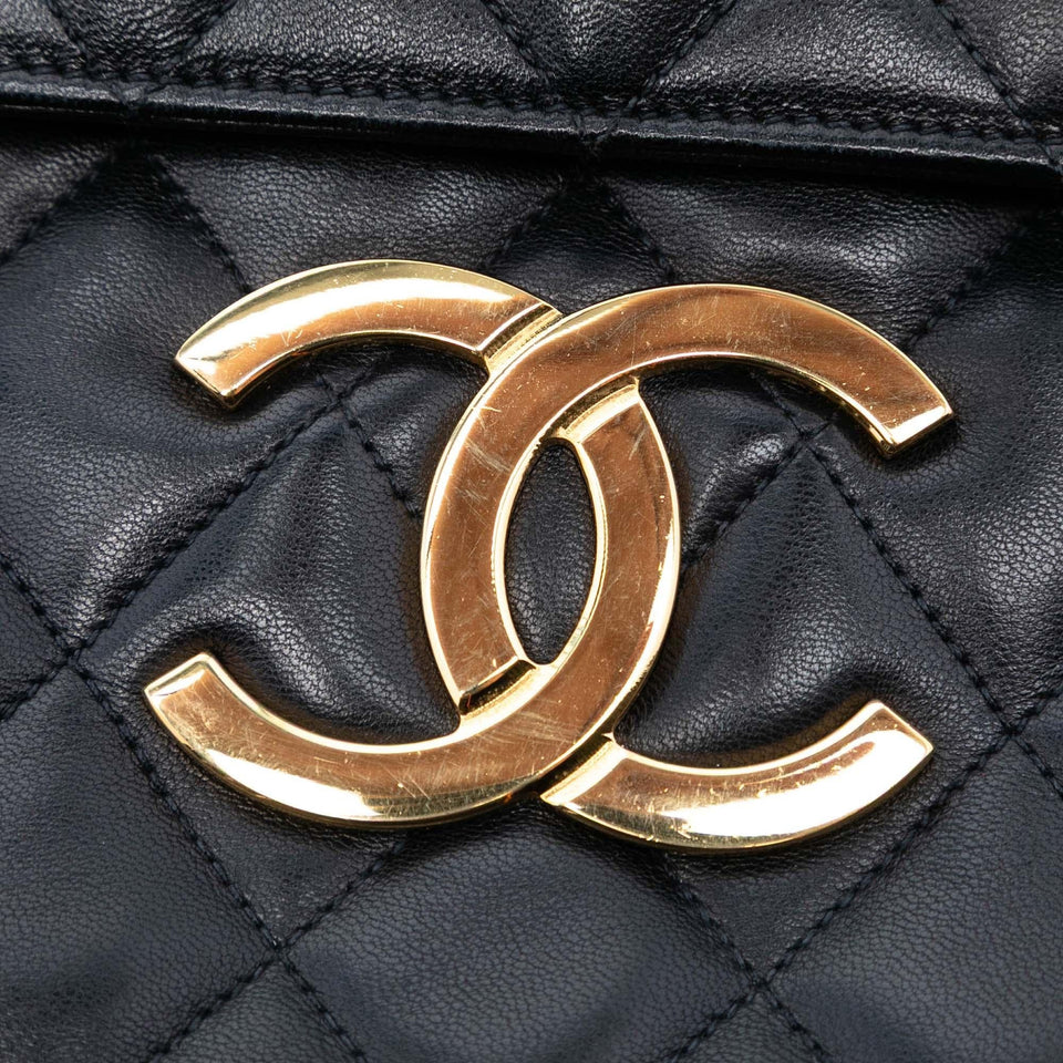 Chanel Maxi XL Quilted Lambskin Clutch with Chain