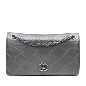 Chanel Medium Embossed Calfskin Propeller Flap