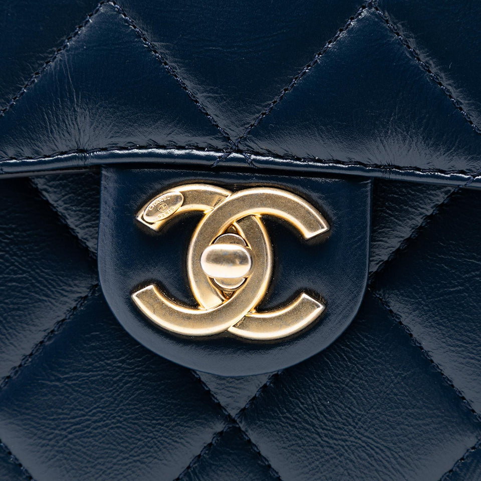 Chanel Mini CC Quilted Shiny Calfskin Round Moon Messenger Flap