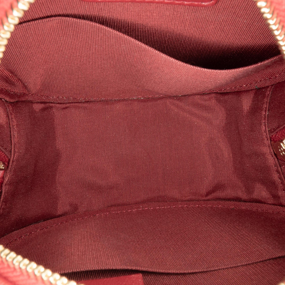 Chanel Quilted Lambskin Round Pearl Clutch with Chain (SHG-QFU7OK)