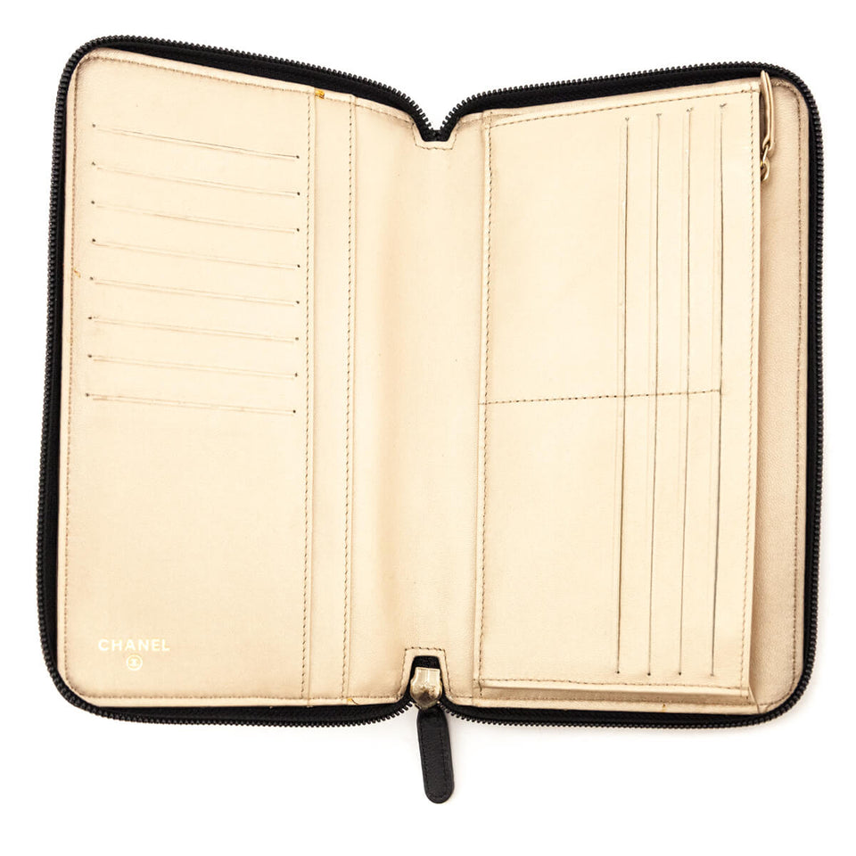 Chanel Black Camellia Embossed Lambskin Long Zip Wallet