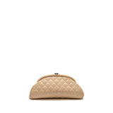 Chanel timeless kisslock clutch caviar beige