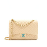 Chanel Maxi Classic Double Flap Bag Caviar beige