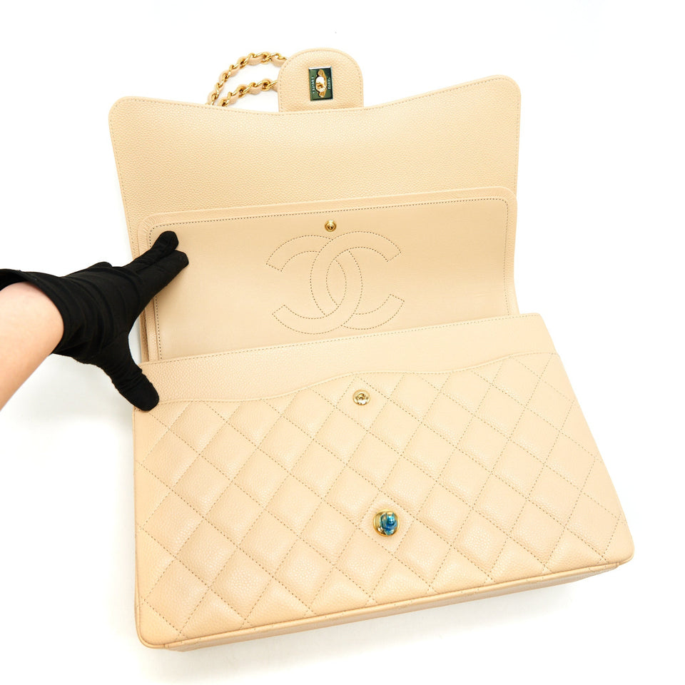 Chanel Maxi Classic Double Flap Bag Caviar beige