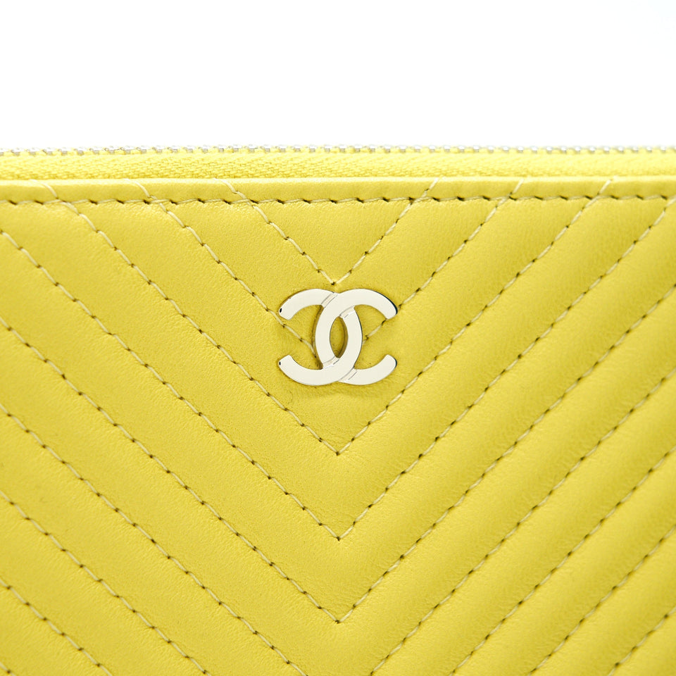 Chanel CHEVRON CLUTCH BAG IN YELLOW
