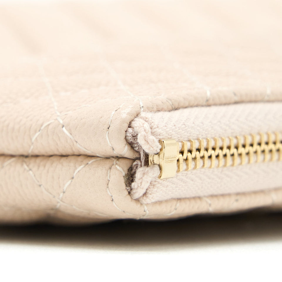 Chanel Clutch Chevron Caviar Beige
