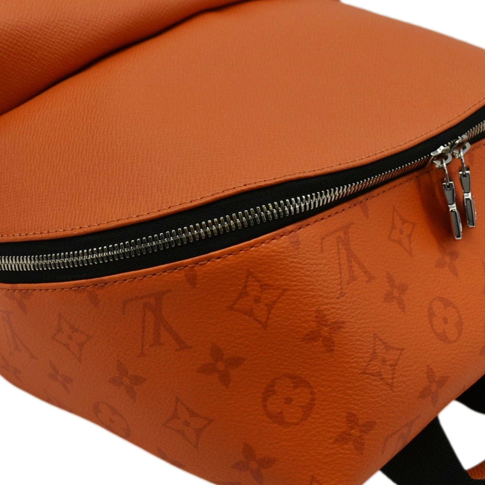 Louis Vuitton Discovery Taiga leather Backpack Orange