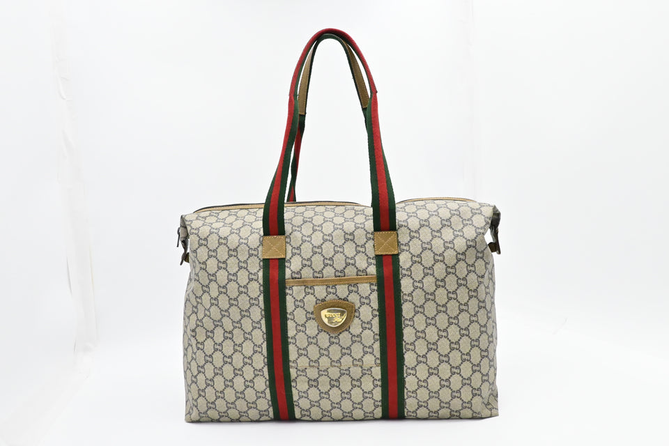 Gucci Plus Zipped Travel Bag in GG Plus Coated Canvas