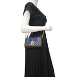 Louis Vuitton Twist Sequin Bird Epi Leather Chain Clutch Black