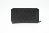 Gucci Zippy Organizer in Black Guccissima Leather
