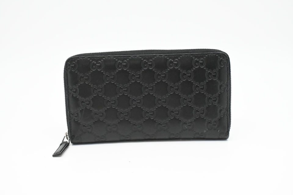 Gucci Zippy Organizer in Black Guccissima Leather