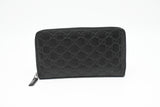 Gucci Zippy Organizer in Black Guccissima Leather