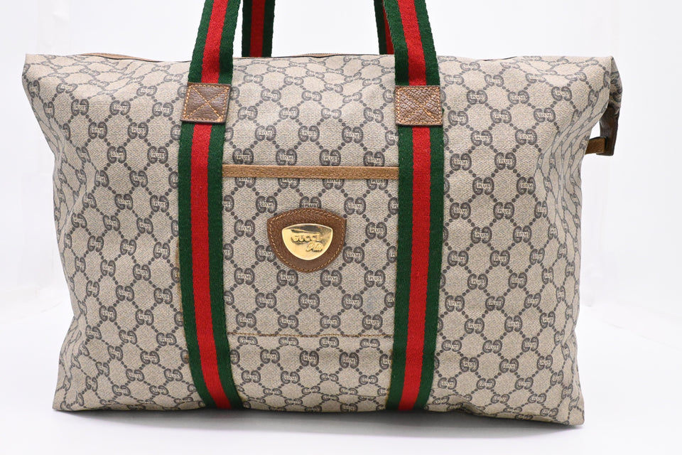 Gucci Plus Shoulder Travel Bag in GG Coated Canvas