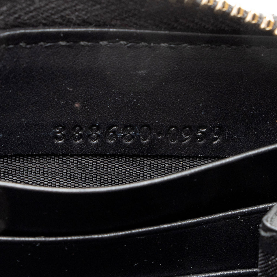 Gucci Guccissima Leather Bow Zip Around Wallet