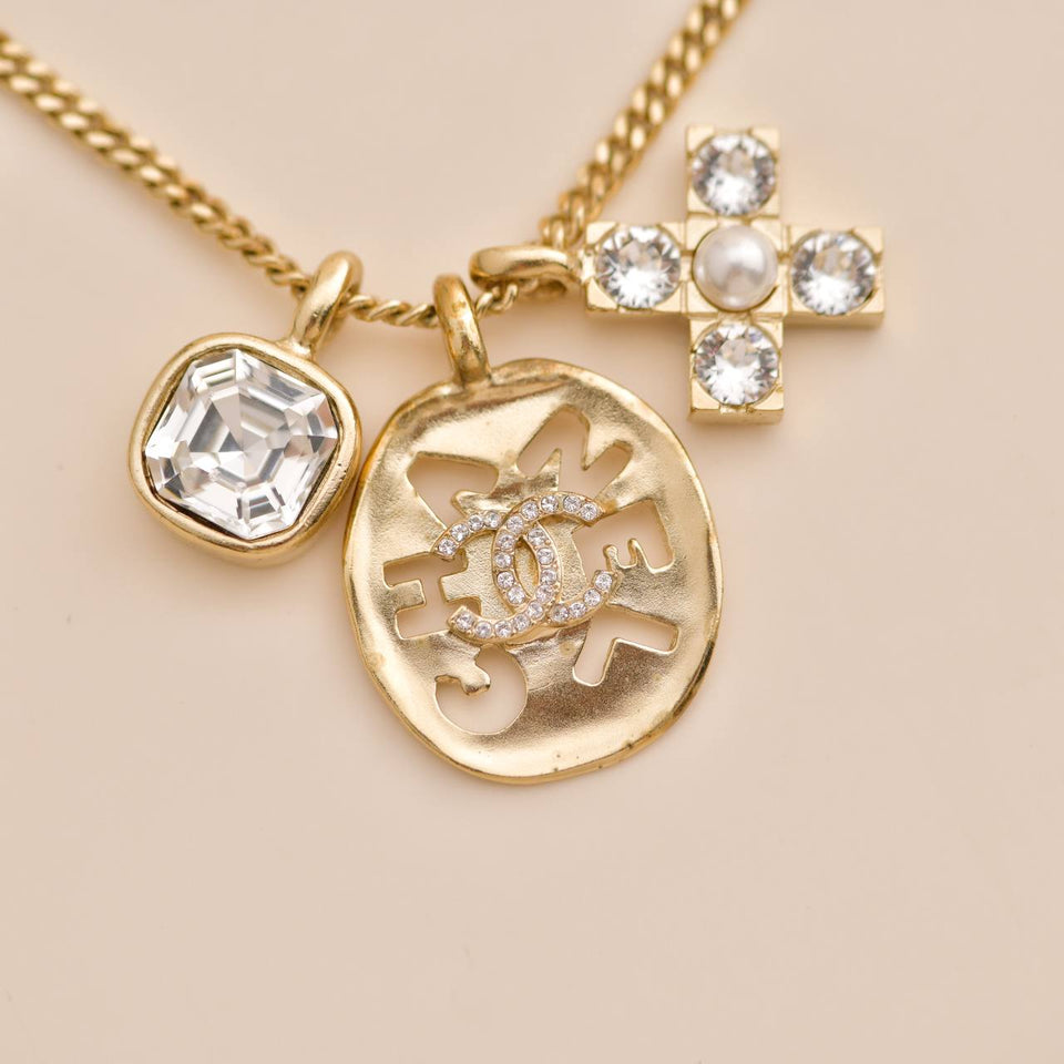 Chanel 2021 Multi Motif Crystal Gold Tone Pendant Necklace
