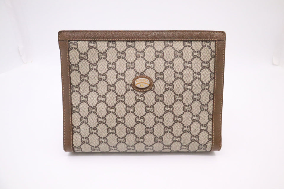 Gucci Plus Clutch in GG Supreme Canvas