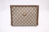Gucci Plus Clutch in GG Supreme Canvas