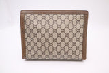 Gucci Plus Clutch in GG Supreme Canvas