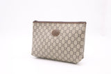 Gucci Plus Clutch in GG Supreme Canvas