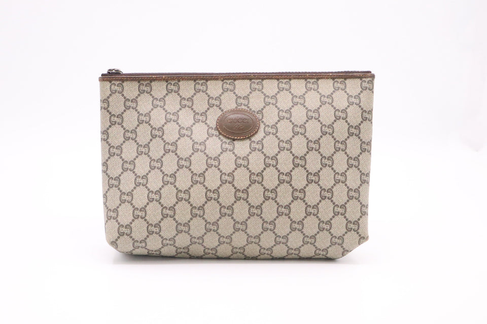 Gucci Plus Clutch in GG Supreme Canvas