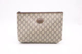 Gucci Plus Clutch in GG Supreme Canvas