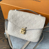 Louis Vuitton Pochette Metis Empreinte Monogram Crossbody Bag