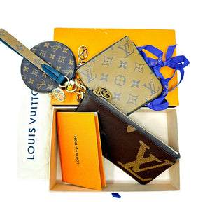 Louis Vuitton Reverse Monogram Giant Trio Pouch Clutch