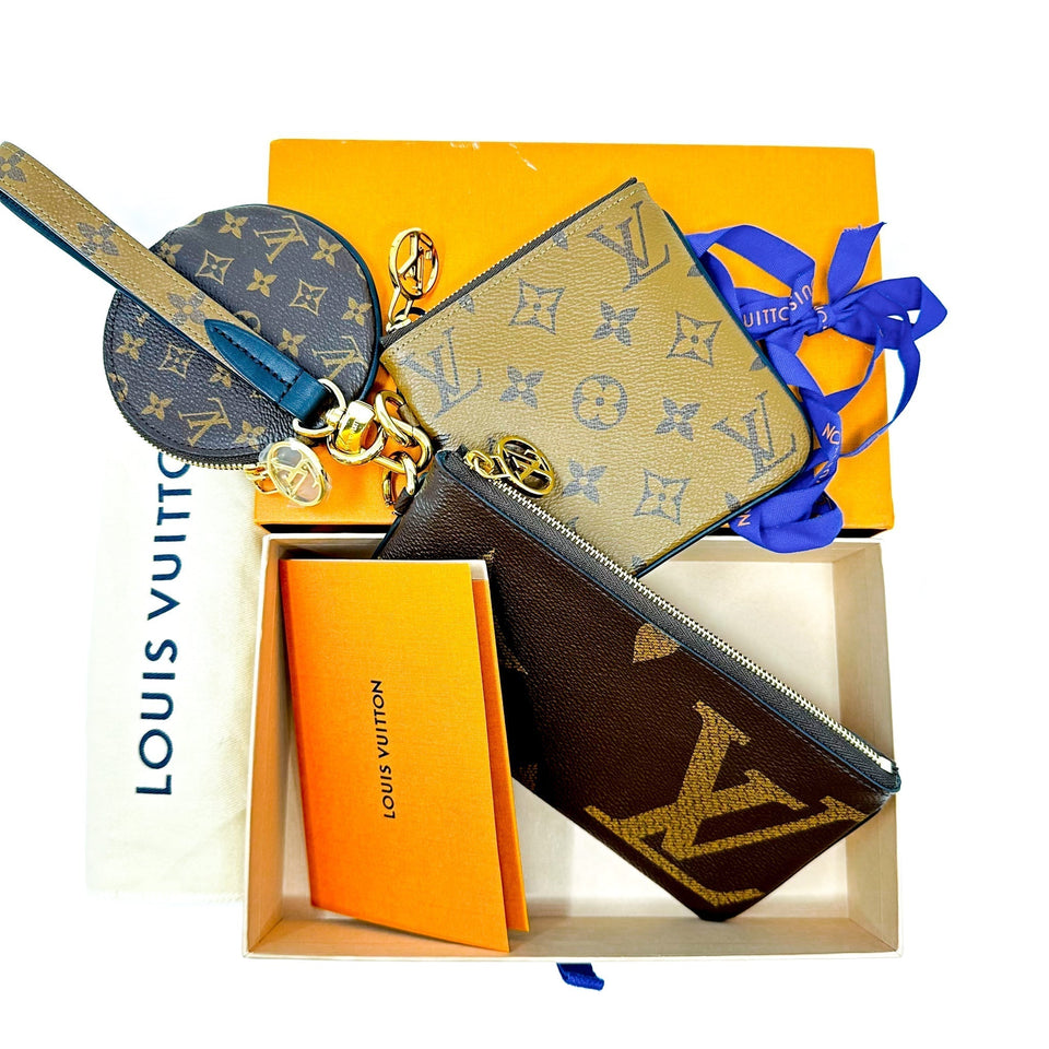 Louis Vuitton Reverse Monogram Giant Trio Pouch Clutch