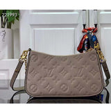 Louis Vuitton LV Women Easy Pouch On Strap Beige Embossed Monogram Empreinte Cowhide Leather Clutch
