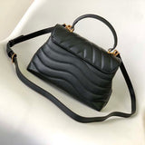 Louis Vuitton LV Women Hold Me Top-Handle Bag Black Smooth Cowhide Leather