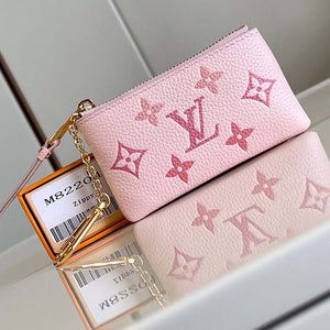 Louis Vuitton LV Women Key Pouch Pink Monogram Empreinte Embossed Supple Grained Cowhide Leather Clutch