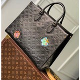Louis Vuitton LV Women LV x YK OnTheGo MM Black Embossed Grained Monogram Cowhide Leather Flower Tote