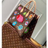 Louis Vuitton LV Women LV x YK OnTheGo MM Monogram Coated Canvas Faces Embroidery Tote